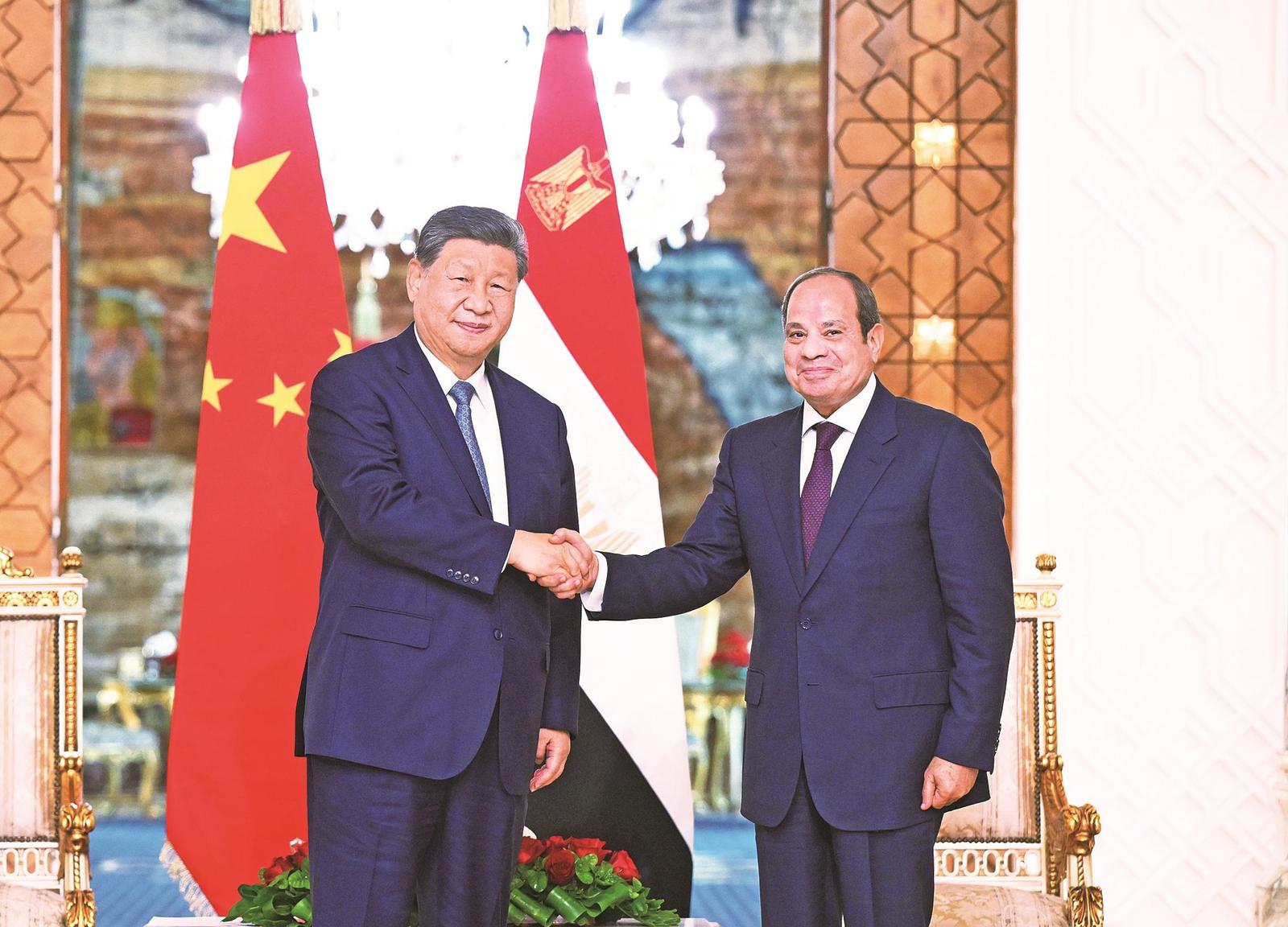 埃及总统塞西同中国国家主席习近平在开罗太阳宫举行会谈。新华社发