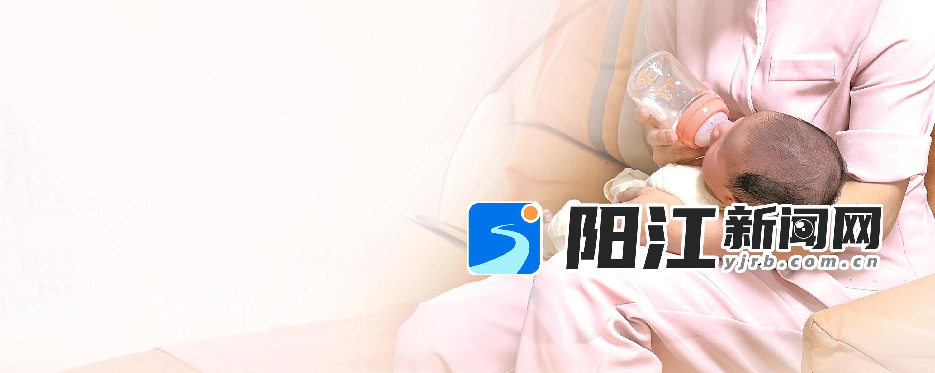 月子中心护师为新生儿喂奶。